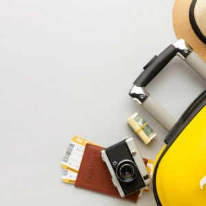 flat-lay-yellow-luggage-with-copy-space